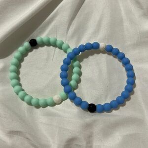 2 Lokai Bracelets